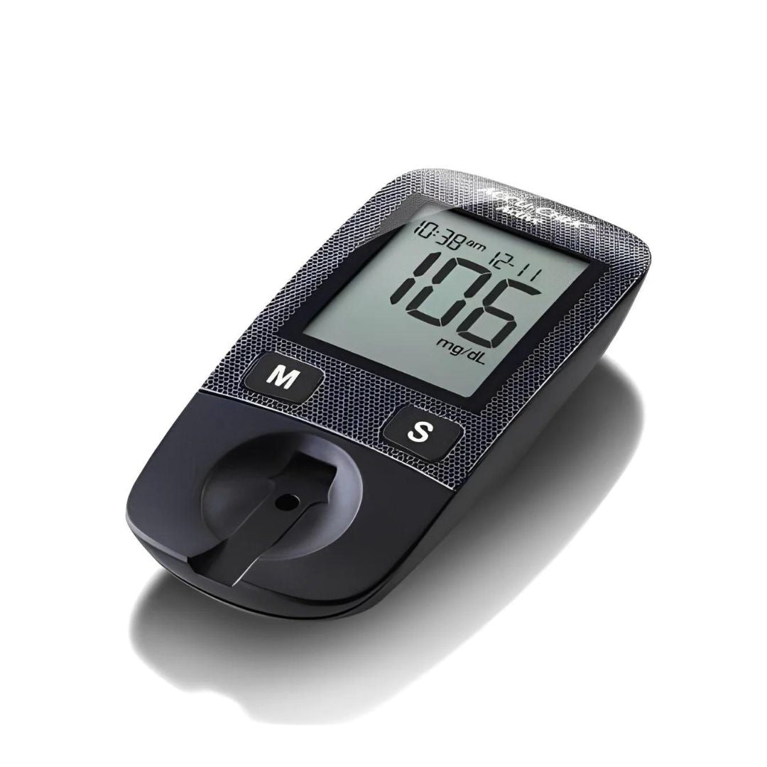 Glucómetro Accuchek Active sobre superficie